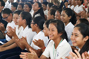 JPA Image Gallery - Students laughing and clapping at assembly - Jay Pritzker Academy, Siem Reap, Cambodia