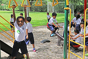 JPA Image Gallery - Primary students enjoying the playground at recess - Jay Pritzker Academy, Siem Reap, Cambodia
