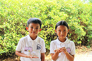 JPA Image Gallery - Primary students presenting their toothpick models - Jay Pritzker Academy, Siem Reap, Cambodia