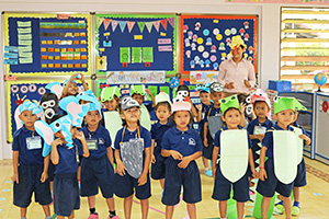 JPA Image Gallery - Kindergarten class with animal masks dress-up - Jay Pritzker Academy, Siem Reap, Cambodia