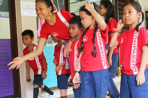 JPA Image Gallery - Primary students engaged in a game as part of Khmer New Year celebration - Jay Pritzker Academy, Siem Reap, Cambodia