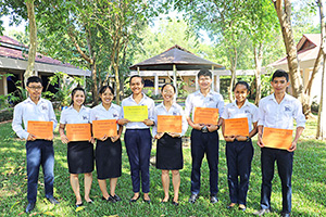 JPA Image Gallery - High school students holding Honor Roll certificates after Honors Assembly - Jay Pritzker Academy, Siem Reap, Cambodia