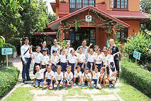 JPA Image Gallery - Primary students looking at exhibit at Nature Discovery Center - Jay Pritzker Academy, Siem Reap, Cambodia