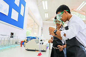 JPA Image Gallery - High school students working on science activity in the lab - Jay Pritzker Academy, Siem Reap, Cambodia