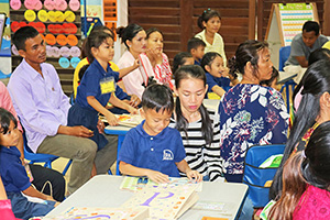 JPA Image Gallery - Parents and kindergarten students attending classroom presentation - Jay Pritzker Academy, Siem Reap, Cambodia