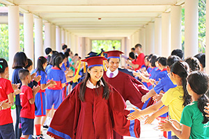 JPA Image Gallery - Graduating class of 2019 on graduation walk through campus - Jay Pritzker Academy, Siem Reap, Cambodia