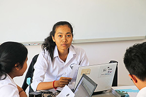 JPA Image Gallery - High school students working at computers in the college office - Jay Pritzker Academy, Siem Reap, Cambodia
