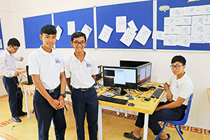 JPA Image Gallery - High school students at their computers in IT - robotics class - Jay Pritzker Academy, Siem Reap, Cambodia