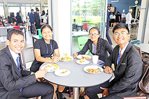 JPA Image Gallery - High school students attending Model UN enjoy a meal - Jay Pritzker Academy, Siem Reap, Cambodia