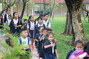 JPA Image Gallery - A queue of students arrive on campus - Jay Pritzker Academy, Siem Reap, Cambodia