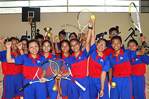 JPA Image Gallery - Students gather for a photo after enjoying their tennis practice - Jay Pritzker Academy, Siem Reap, Cambodia