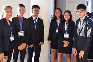 JPA Image Gallery - High school students pose for a photo while attending the model UN - Jay Pritzker Academy, Siem Reap, Cambodia