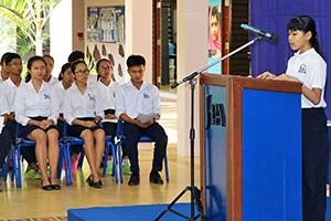 JPA Image Gallery - A student reads her speech at school assembly - Jay Pritzker Academy, Siem Reap, Cambodia