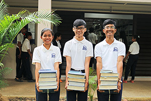 JPA Image Gallery - Smiling students after receiving their books for each subject - Jay Pritzker Academy, Siem Reap, Cambodia