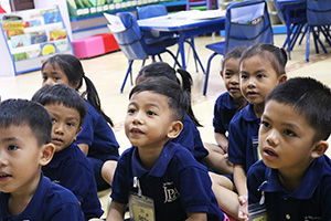 JPA Image Gallery - Pre-K students sitting on the floor - Jay Pritzker Academy, Siem Reap, Cambodia
