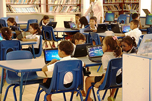 JPA Image Gallery - A primary class engages in a class activity on laptops - Jay Pritzker Academy, Siem Reap, Cambodia