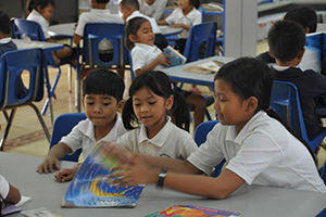 JPA Image Gallery - Students read books at the campus library - Jay Pritzker Academy, Siem Reap, Cambodia
