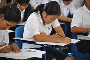 JPA Image Gallery - High school students work on a task in class - Jay Pritzker Academy, Siem Reap, Cambodia