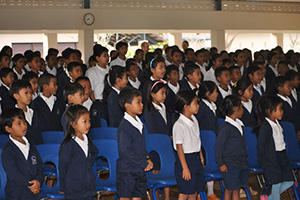 JPA Image Gallery - Students stand at assembly - Jay Pritzker Academy, Siem Reap, Cambodia
