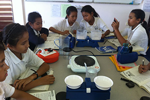 JPA Image Gallery - Students weigh and measure in science class - Jay Pritzker Academy, Siem Reap, Cambodia